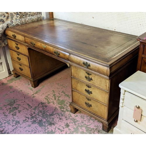 195 - PEDESTAL DESK, Georgian style walnut with an inlaid tooled leather top and five drawers including sh... 