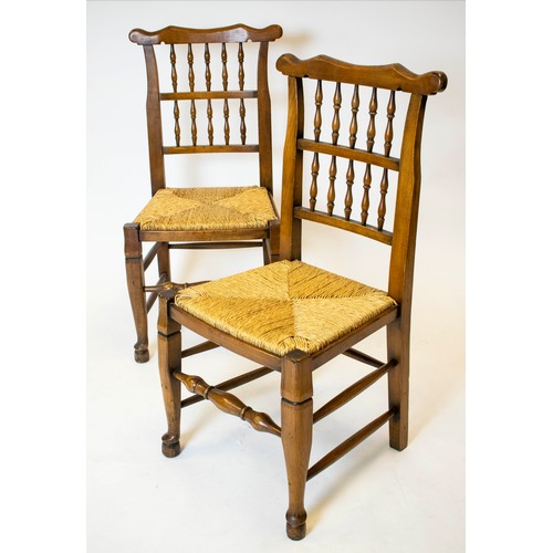 257 - DINING CHAIRS 8  101cm H x 50cm W, a set of eight, Lancashire style oak with rush seats. (8)