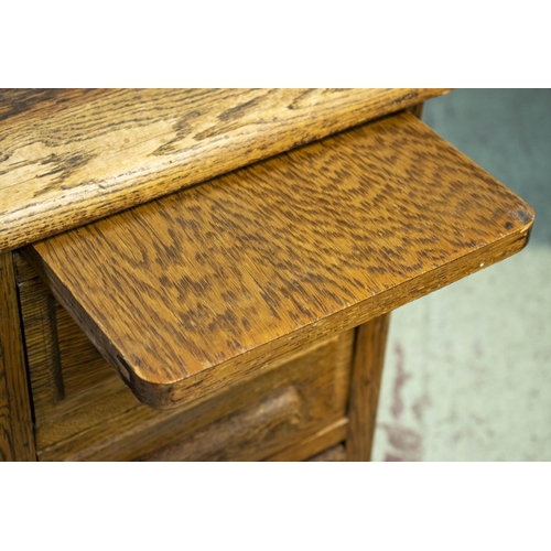 258 - DESK, 77cm H x 122cm W x 80cm D, circa 1925 oak with two slides and eight drawers.