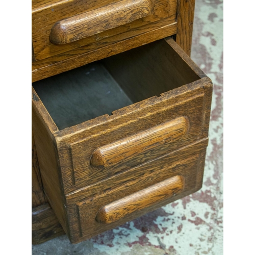 258 - DESK, 77cm H x 122cm W x 80cm D, circa 1925 oak with two slides and eight drawers.