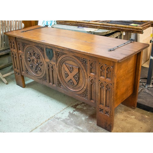 268 - COFFER, 76cm H x 173cm W x 59cm D, plantagenet design oak with gothic carved front.