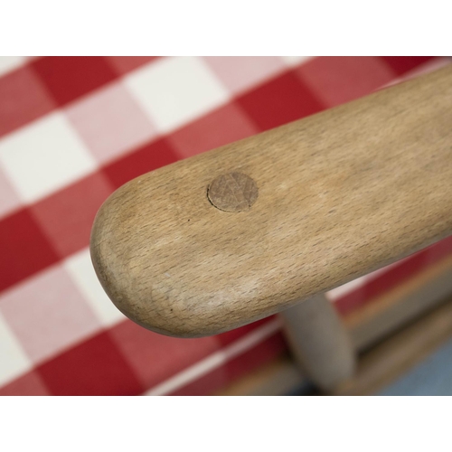 282 - ERCOL SOFA, 77cm H x 133cm W, seat height 31cm, beechwood with red gingham cushions.