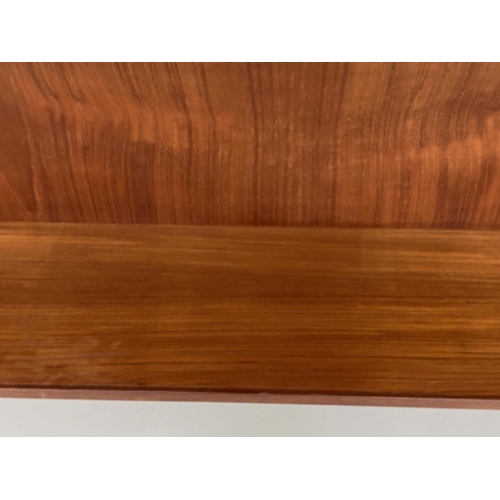 285 - DESK, 1970's Danish teak with six frieze drawers and tapering supports, 130cm x 71cm x 74cm H.