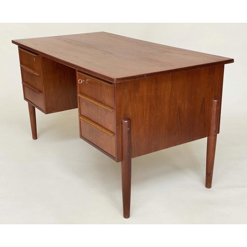 285 - DESK, 1970's Danish teak with six frieze drawers and tapering supports, 130cm x 71cm x 74cm H.