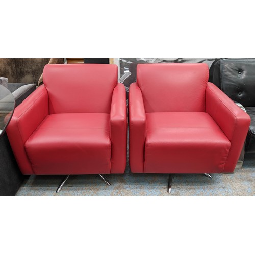 302 - LOUNGE CHAIRS, a pair, swivel design red leather upholstere,d polished metal base, 80cm x 80cm x 85c... 