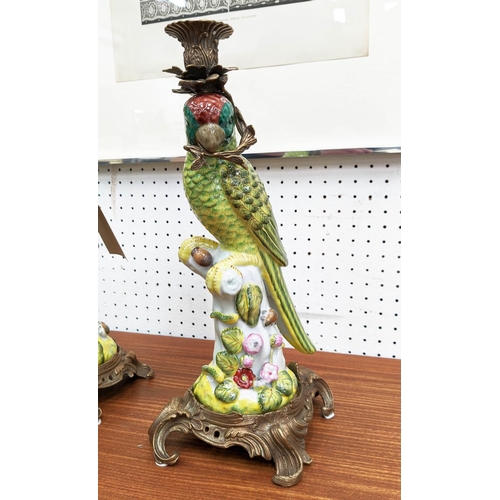 334 - PARROT CANDELABRA, a pair, glazed ceramic with gilt metal mounts and sconces, 36cm H. (2)