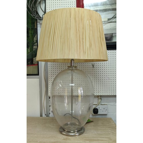 338 - TABLE LAMP, glass and polished metal base, with paper cord shade, 81cm H.