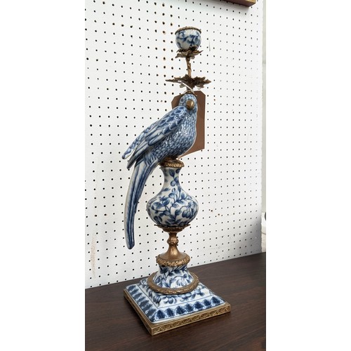 353 - CANDELABRUM, 48cm H, in the form of a cockatoo, blue and white ceramic, gilt metal mount.