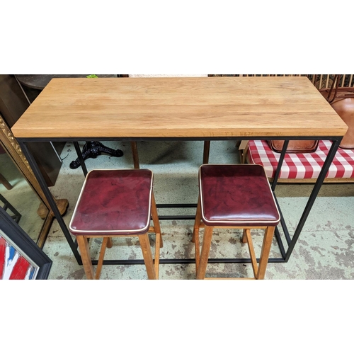 388 - BAR TABLE, 120cm W x 45cm D x91cm H, wooden top and black metal base and two stools, red seats with ... 