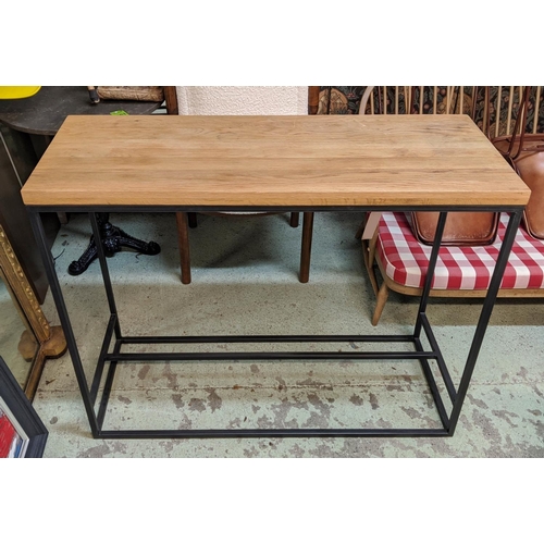 388 - BAR TABLE, 120cm W x 45cm D x91cm H, wooden top and black metal base and two stools, red seats with ... 