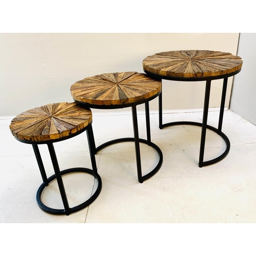 404 - NEST OF TABLES, graduated set of three, largest measuring 46cm high, 45cm diameter, metal bases. (3)