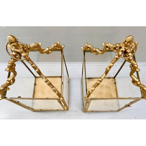 407 - STORM LANTERNS, 60cm high, 27cm wide, a pair, square sectioned, gilt metal frames glazed sides. (2)