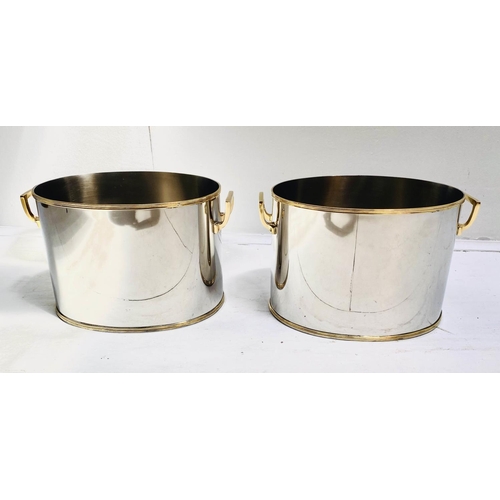 408 - ICE BUCKETS, pair, 22cm high, 33cm wide, 20cm deep, twin-handled, polished metal with gilt detail. (... 