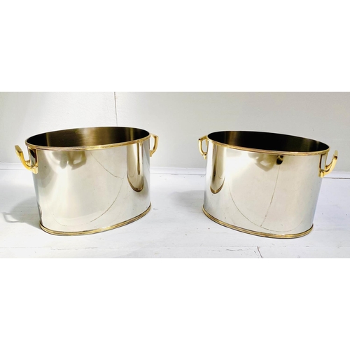 408 - ICE BUCKETS, pair, 22cm high, 33cm wide, 20cm deep, twin-handled, polished metal with gilt detail. (... 