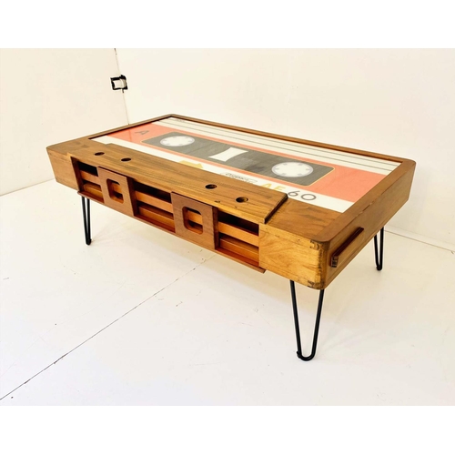 414 - LOW TABLE, 40cm high x 110cm wide x 60cm deep, cassette tape design, with storage to one side.