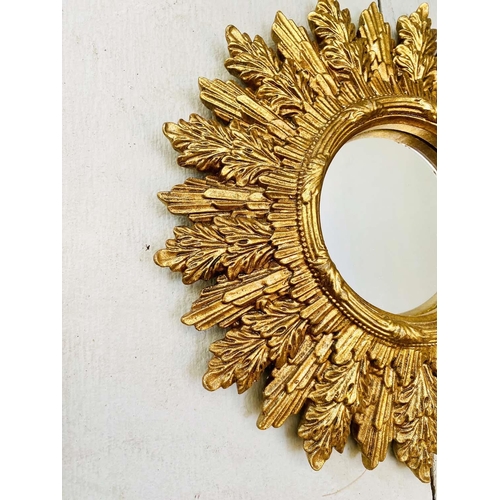 415 - CONVEX MIRRORS, a collection of nine, gilt frames, of various designs and sizes.