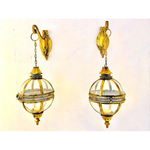 420 - WALL HANGING GLOBULAR LANTERNS, a pair, Regency style, gilt metal, 80cm x 25cm x 25cm. (2)