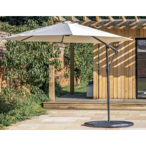 436 - CANTILEVERED GARDEN PARASOL, white fabric includes base, 3000mm W x 2450mm D x 3000mm H.