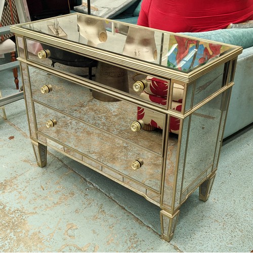 511 - MIRRORED CHEST, in an antiqued finish, 49cm x 91cm H x 107cm.