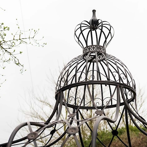 363 - ARCHITECTURAL GARDEN PAGODA, 325cm H x 200cm diam., Regency style, painted metal.