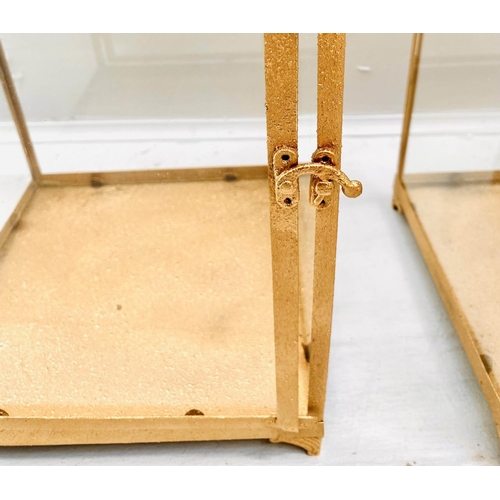 367 - STORM LANTERNS, 60cm high, 27cm wide, a pair, square sectioned, gilt metal frames glazed sides. (2)