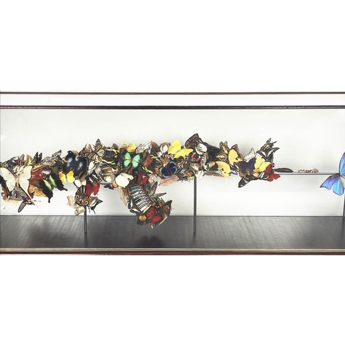 1 - BRAN SYMONDSON (b1971), 'Beat of a wing', decommissioned AK47, mounted with real butterflies and sym... 