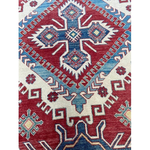 126 - FINE EAGLE KAZAK CARPET, 355cm x 265cm.