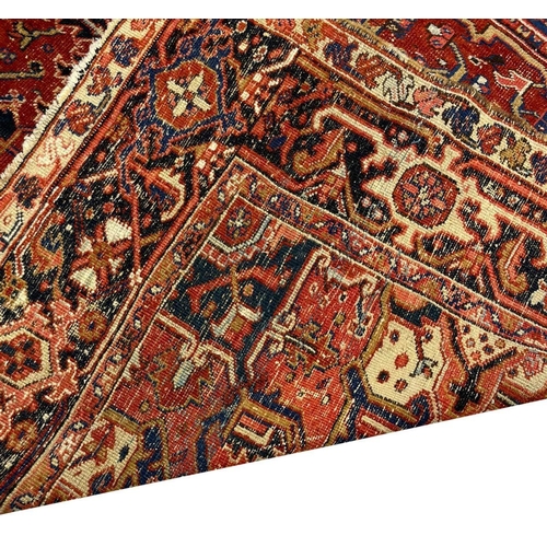 128 - ANTIQUE PERSIAN HERIZ CARPET, 350cm x 255cm.