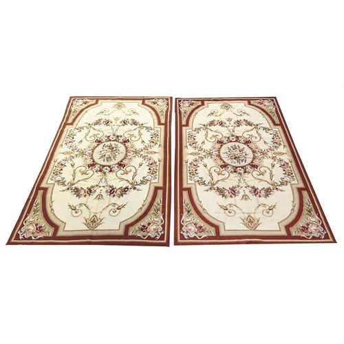 130 - AUBUSSON SAVONNERIE DESIGN RUGS, a pair, 180cm x 119cm. (2)