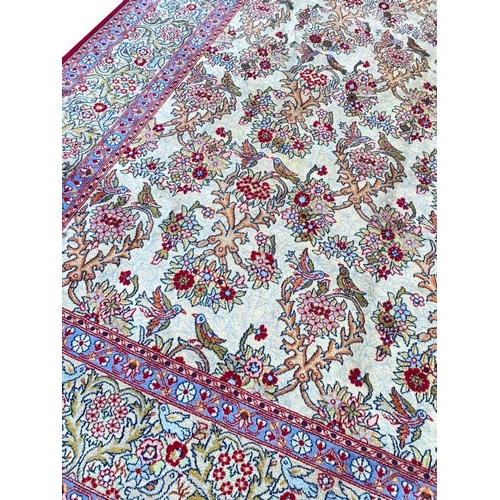 132 - PERSIAN QUM CARPET, 375cm x 275cm.