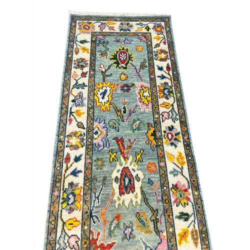 134 - CONTEMPORARY OUSHAK LONG RUNNER, 484cm x 80cm.