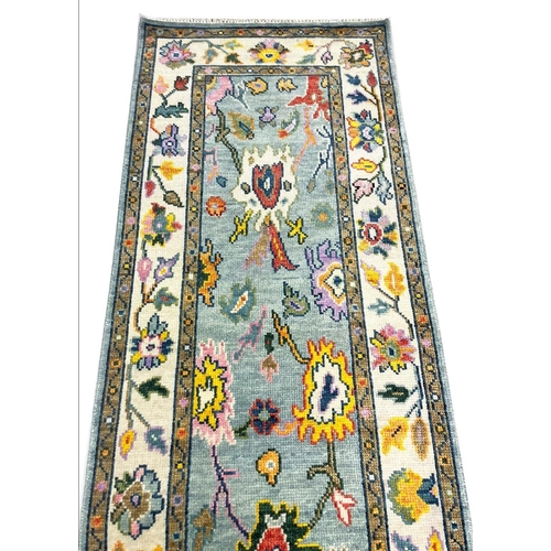 134 - CONTEMPORARY OUSHAK LONG RUNNER, 484cm x 80cm.