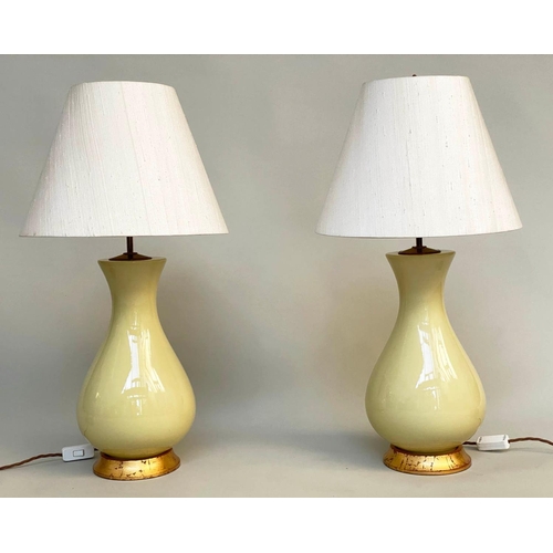 165 - TABLE LAMPS, a pair, 'Louisa' lemon yellow glazed ceramic of vase form with giltwood bases and span ... 