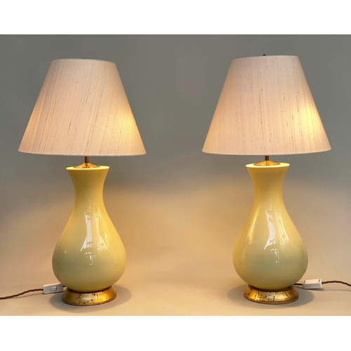 165 - TABLE LAMPS, a pair, 'Louisa' lemon yellow glazed ceramic of vase form with giltwood bases and span ... 