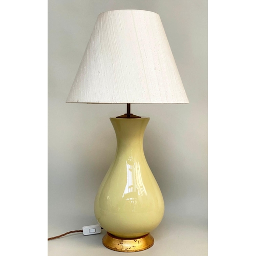 165 - TABLE LAMPS, a pair, 'Louisa' lemon yellow glazed ceramic of vase form with giltwood bases and span ... 