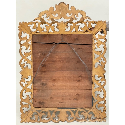 169 - FLORENTINE WALL MIRROR, late 19th/early 20th century, carved giltwood with bevelled mirror plate and... 