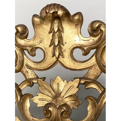 169 - FLORENTINE WALL MIRROR, late 19th/early 20th century, carved giltwood with bevelled mirror plate and... 