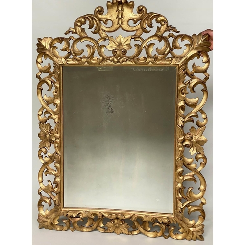 169 - FLORENTINE WALL MIRROR, late 19th/early 20th century, carved giltwood with bevelled mirror plate and... 