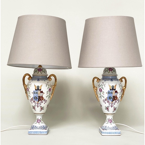 171 - TABLE LAMPS, a pair, urn shaped glazed ceramic each with armorial crest and twin gilded handles with... 