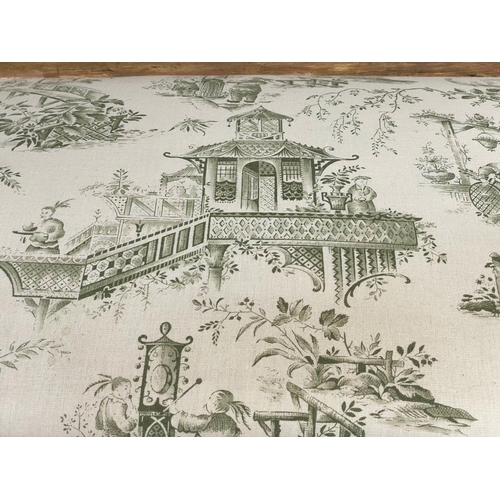 175 - BANQUETTE, 19th century giltwood with green Chinese toile printed upholstery with turned fluted supp... 