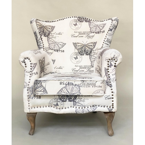 181 - WING ARMCHAIR, studded toile printed cotton upholstered with cushion, 77cm x 76cm x 87cm H.