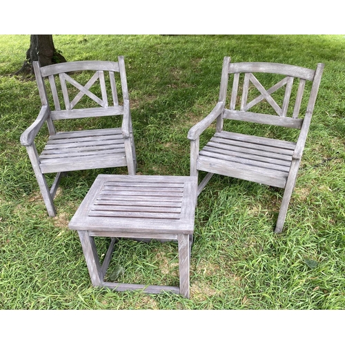 192 - GARDEN ARMCHAIRS, a pair, weathered teak and slatted with lattice backs together with a table, chair... 