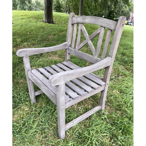 192 - GARDEN ARMCHAIRS, a pair, weathered teak and slatted with lattice backs together with a table, chair... 