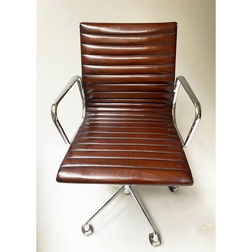 213 - REVOLVING DESK CHAIR, Charles and Ray Eames inspired with ribbed tan leather seat revolving and recl... 