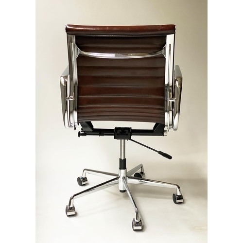 213 - REVOLVING DESK CHAIR, Charles and Ray Eames inspired with ribbed tan leather seat revolving and recl... 