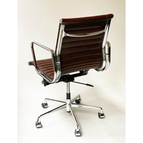 213 - REVOLVING DESK CHAIR, Charles and Ray Eames inspired with ribbed tan leather seat revolving and recl... 