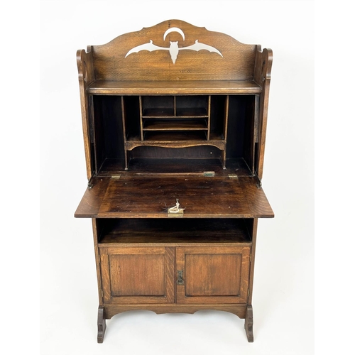 219 - ARTS AND CRAFTS BUREAU, 69cm W x 133cm H x 26cm D, Liberty style oak, with  pierced bat and crescent... 