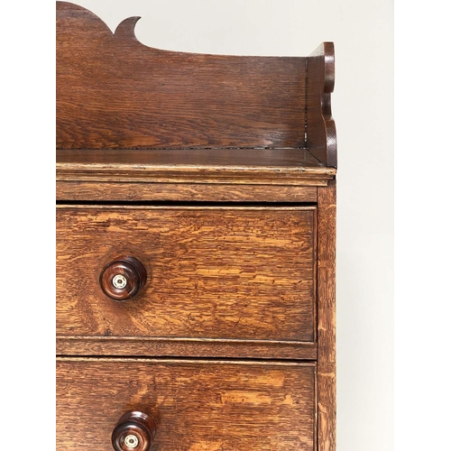 254 - CHEST, 19th century oak with shaped 3/4 gallery above four long graduated drawers with bone escutche... 