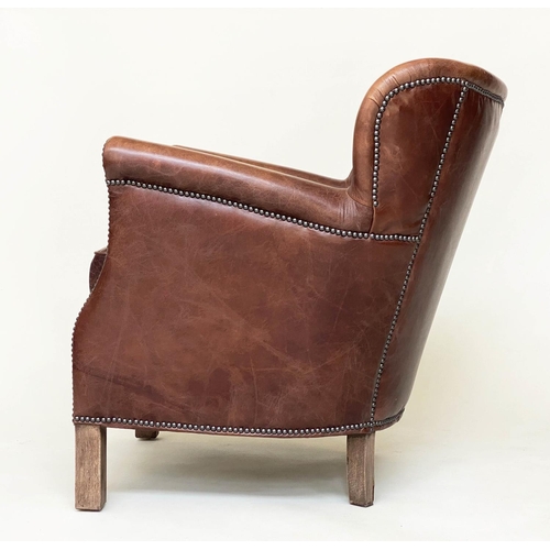 257 - LITTLE PROFESSOR ARMCHAIR, Halo tan leather and brass bound with rounded back and arms, 67cm W.