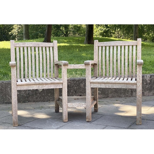 277 - GARDEN CONVERSATION SEATS, silvery weathered teak slatted armchairs with conjoined table, 156cm x 90... 